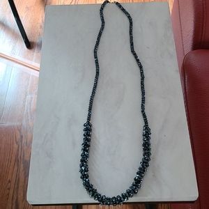 Long necklace with sparkling cut beads